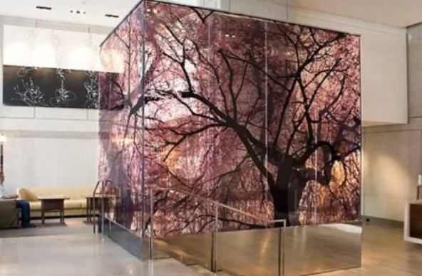 Glass Print Media – Custom UV Flatbed Printed Glass Panels, Tables, Space Dividers and Displays with 9-Color Including White Ink by INFOCUS, Dubai